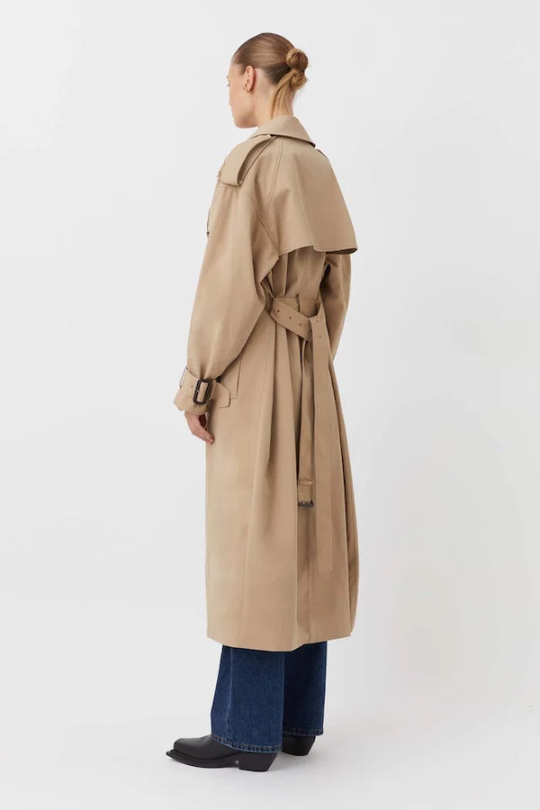 Evans Trench Coat Sand by Camilla and Marc — Oversized twill trench with double-breasted front, epaulettes, belt, and recycled polyester lining. Dry clean only.
