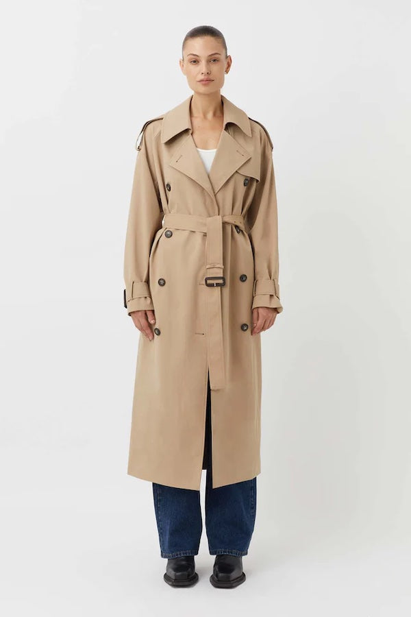 Evans Trench Coat Sand by Camilla and Marc — Oversized twill trench with double-breasted front, epaulettes, belt, and recycled polyester lining. Dry clean only.