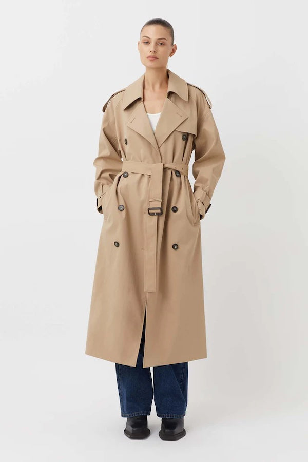 Evans Trench Coat Sand by Camilla and Marc — Oversized twill trench with double-breasted front, epaulettes, belt, and recycled polyester lining. Dry clean only.