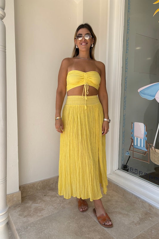 Calypso Skirt by D Artemide, maxi skirt with shirred waist and front split. Perfect for beach days or effortless summer looks.