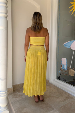 Calypso Skirt by D Artemide, maxi skirt with shirred waist and front split. Perfect for beach days or effortless summer looks.