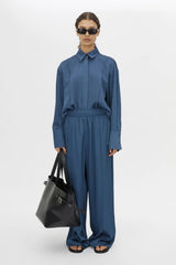 Cameo Pant by Camilla and Marc, a steel grey relaxed wide-leg pant with elasticated waist, pin-stitch detailing and tailored creases.