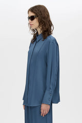 Cameo Shirt by Camilla and Marc, an oversized steel grey long sleeve shirt with concealed buttons, pin-stitch seams and wide cuffs.