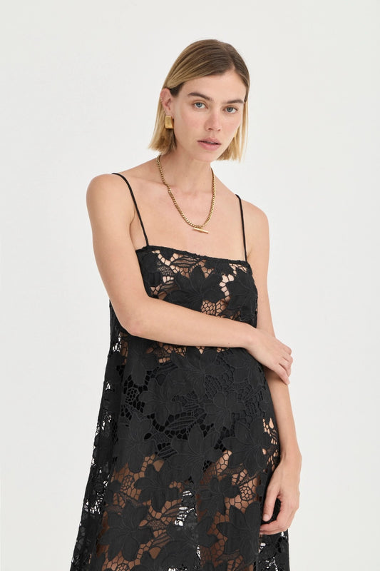Camilla Crochet Lace Dress Noir by Solaqua – black floral crochet lace maxi dress with spaghetti straps and sheer finish.