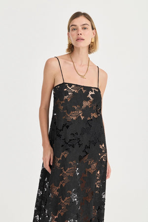 Camilla Crochet Lace Dress Noir by Solaqua – black floral crochet lace maxi dress with spaghetti straps and sheer finish.