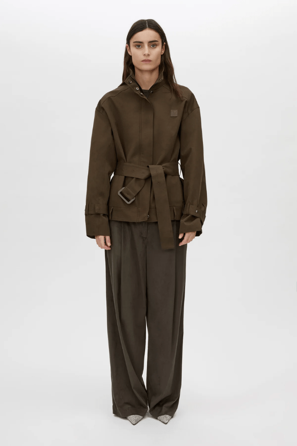 Aileron Bomber Trench in Cypress by Camilla and Marc, zip-through bomber-style trench, branded leather patch, pleated front and back, topstitched belt with pewter buckle, made from 100% cotton and 100% recycled polyester lining.