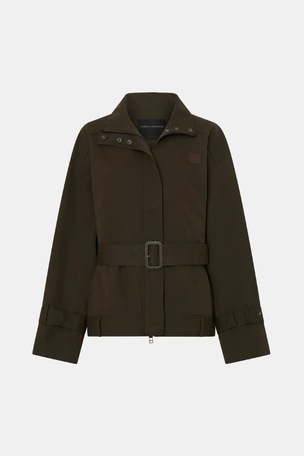Aileron Bomber Trench in Cypress by Camilla and Marc, zip-through bomber-style trench, branded leather patch, pleated front and back, topstitched belt with pewter buckle, made from 100% cotton and 100% recycled polyester lining.