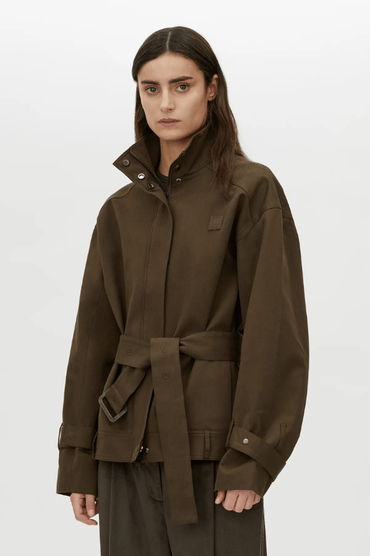 Aileron Bomber Trench in Cypress by Camilla and Marc, zip-through bomber-style trench, branded leather patch, pleated front and back, topstitched belt with pewter buckle, made from 100% cotton and 100% recycled polyester lining.