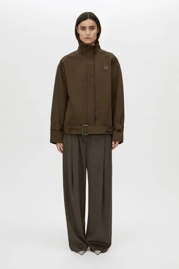 Aileron Bomber Trench in Cypress by Camilla and Marc, zip-through bomber-style trench, branded leather patch, pleated front and back, topstitched belt with pewter buckle, made from 100% cotton and 100% recycled polyester lining.