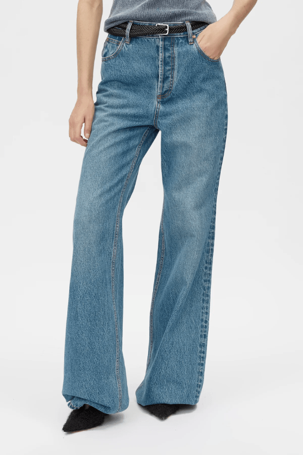 Brynn Denim Jean in Classic Blue by Camilla and Marc, high-waisted, flared-leg silhouette with a super high-rise fit, five-pocket design, and logo shank button.