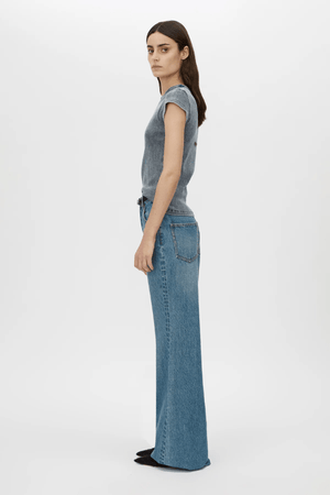 Brynn Denim Jean in Classic Blue by Camilla and Marc, high-waisted, flared-leg silhouette with a super high-rise fit, five-pocket design, and logo shank button.
