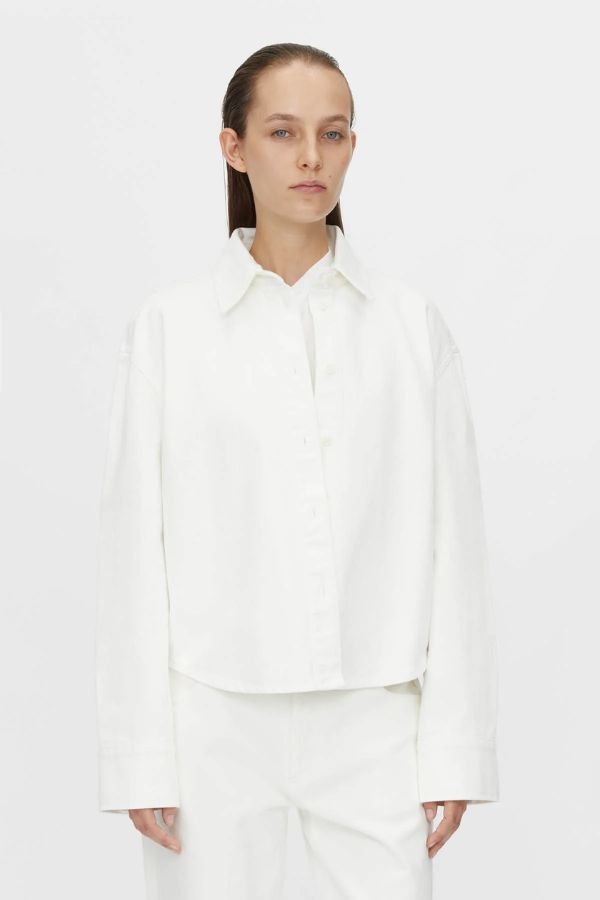Eva Denim Shirt in Salt White by Camilla and Marc, a relaxed 100% cotton shirt with logo corozo buttons and embossed monogram. Perfect for chic layering.
