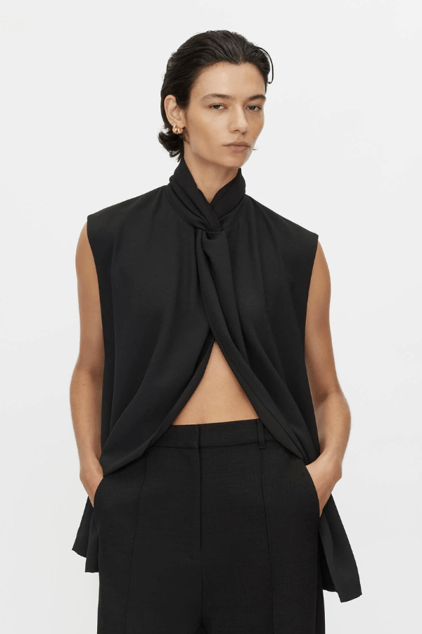 Oriole Twist Neck Top in Black by Camilla and Marc, twist neck design with button-loop closure, invisible zip at the back, fully lined for structure, crafted from 100% recycled polyester.