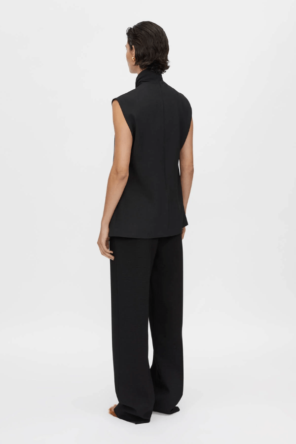 Oriole Twist Neck Top in Black by Camilla and Marc, twist neck design with button-loop closure, invisible zip at the back, fully lined for structure, crafted from 100% recycled polyester.