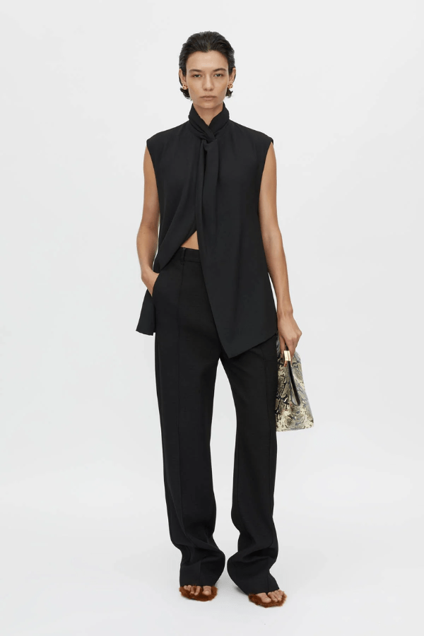 Oriole Twist Neck Top in Black by Camilla and Marc, twist neck design with button-loop closure, invisible zip at the back, fully lined for structure, crafted from 100% recycled polyester.