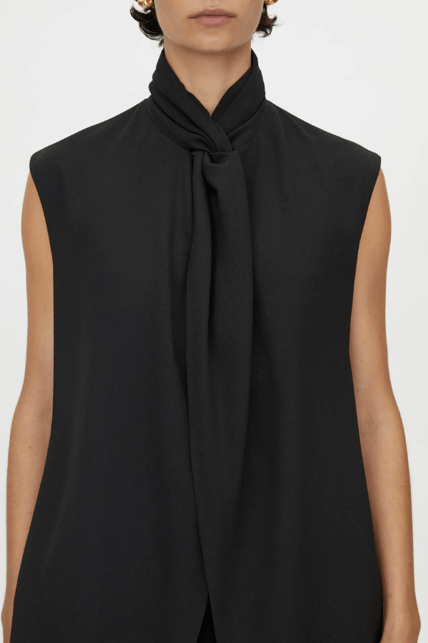 Oriole Twist Neck Top in Black by Camilla and Marc, twist neck design with button-loop closure, invisible zip at the back, fully lined for structure, crafted from 100% recycled polyester.