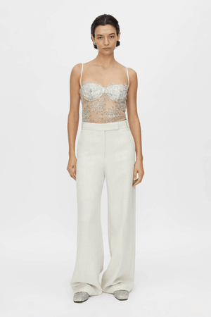 Peregrine Lace Bodysuit in Cream by Camilla and Marc, soft cream lace with scalloped bust cups and adjustable straps, perfect for layering or wearing as a chic, standalone piece.