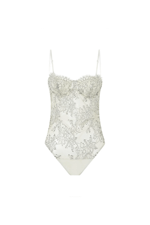 Peregrine Lace Bodysuit in Cream by Camilla and Marc, soft cream lace with scalloped bust cups and adjustable straps, perfect for layering or wearing as a chic, standalone piece.