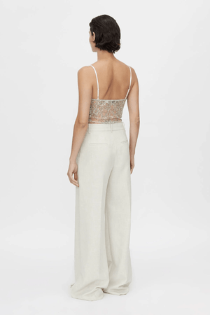 Peregrine Lace Bodysuit in Cream by Camilla and Marc, soft cream lace with scalloped bust cups and adjustable straps, perfect for layering or wearing as a chic, standalone piece.