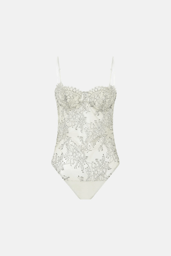 Peregrine Lace Bodysuit in Cream by Camilla and Marc, soft cream lace with scalloped bust cups and adjustable straps, perfect for layering or wearing as a chic, standalone piece.