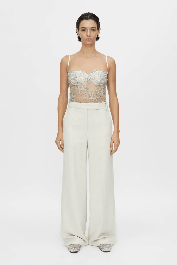 Peregrine Lace Bodysuit in Cream by Camilla and Marc, soft cream lace with scalloped bust cups and adjustable straps, perfect for layering or wearing as a chic, standalone piece.