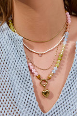 Candy Heart Necklace by Arms of Eve, playful beaded necklace with colourful charms and a golden heart pendant for a sweet, nostalgic statement