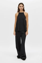 Canova Apron Top by Camilla and Marc, a black jersey apron-style tank with tie-back straps, side splits and embroidered hem.