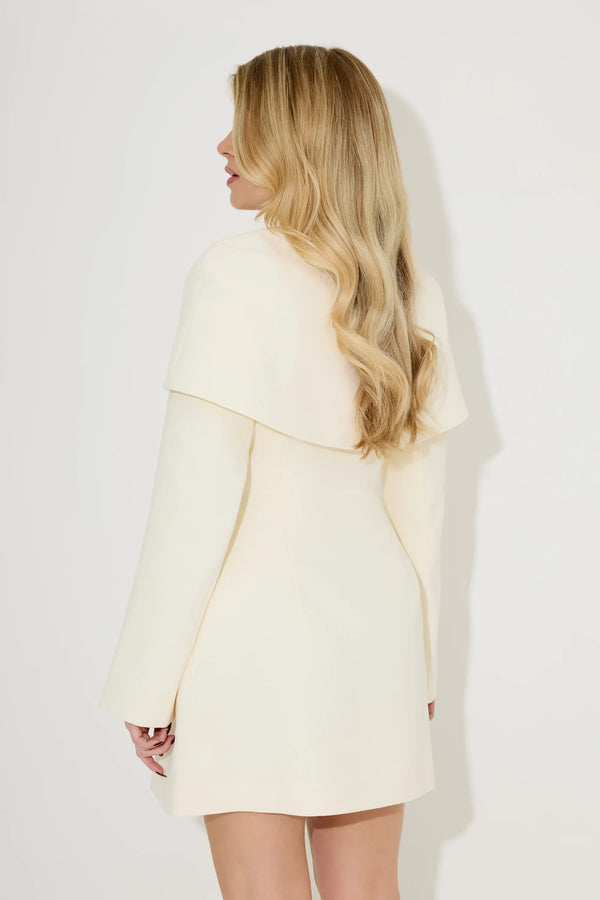 Cape Detail Mini Dress Cream by Odd Muse – a mini dress with cape detail and tailored fit. Perfect for polished styling.