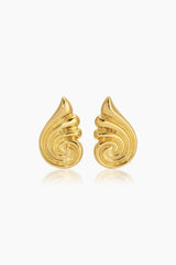 Capri Earrings Gold by Heaven Mayhem – sculptural gold swirl earrings in polished stainless steel.
