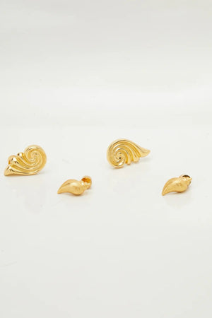 Capri Earrings Gold by Heaven Mayhem – sculptural gold swirl earrings in polished stainless steel.