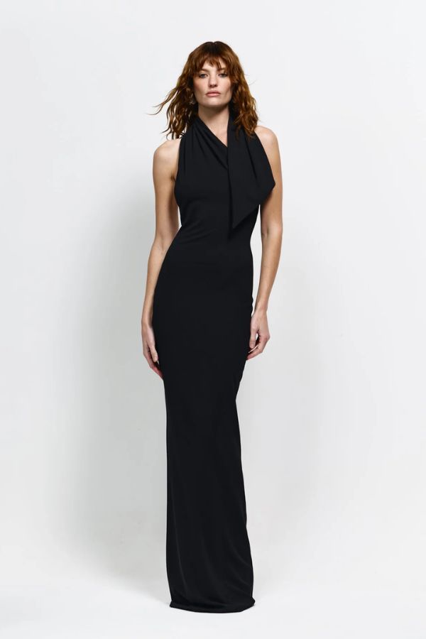 Carlson Gown in Black by Effie Kats, asymmetrical neckline with draped bodice and dramatic open back, perfect for making a refined and elegant statement at evening events or formal occasions.
