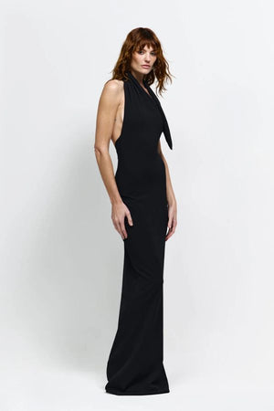 Carlson Gown in Black by Effie Kats, asymmetrical neckline with draped bodice and dramatic open back, perfect for making a refined and elegant statement at evening events or formal occasions.