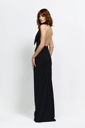 Carlson Gown in Black by Effie Kats, asymmetrical neckline with draped bodice and dramatic open back, perfect for making a refined and elegant statement at evening events or formal occasions.