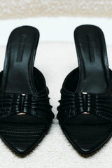 Carrie Mule by Lana Wilkinson, black lizard-embossed leather with gathered straps and stiletto heel. Perfect for chic day-to-night wear.