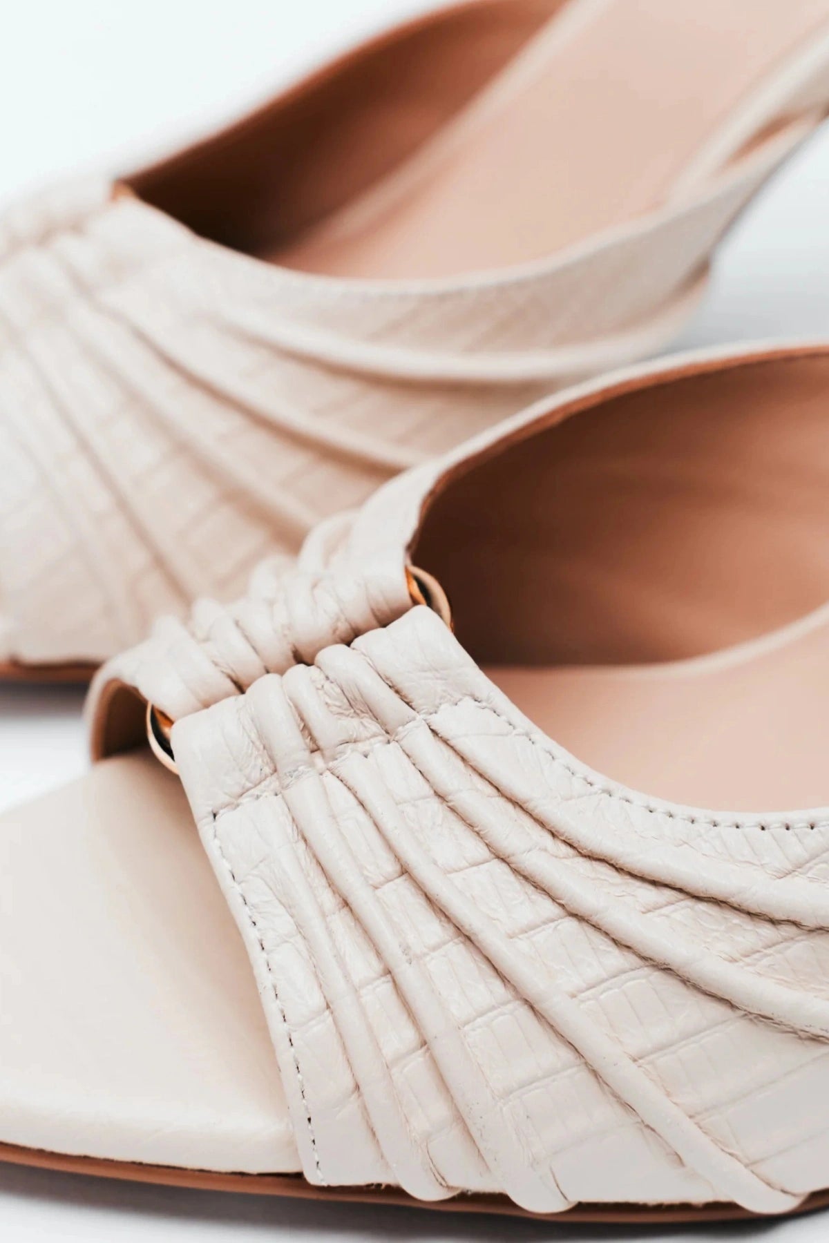 Carrie Mule by Lana Wilkinson, ivory lizard-embossed leather heel with gathered pleats and pointed toe. Perfect for sleek styling.