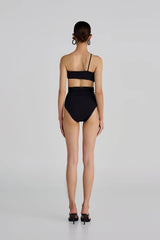 Castano Two Piece Black by Maygel Coronel, ruched bikini with floral detail and high rise bottoms. Perfect for beach days or bold swim looks.