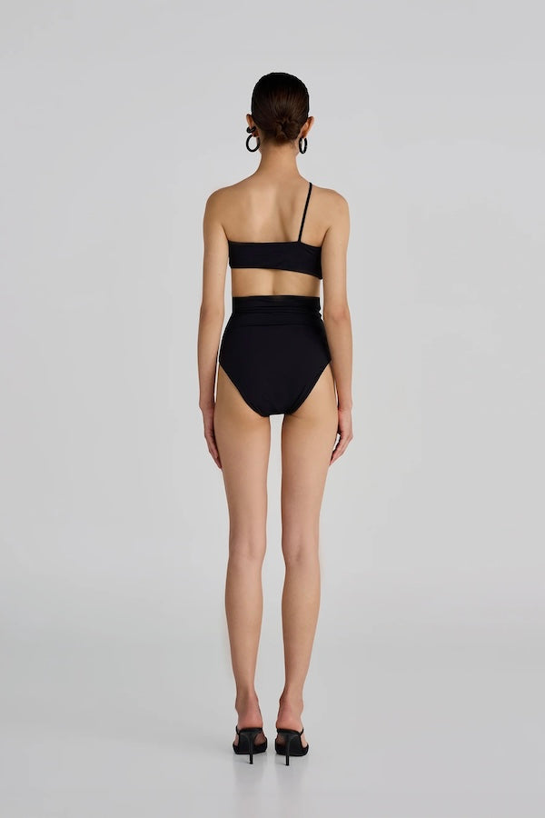 Castano Two Piece Black by Maygel Coronel, ruched bikini with floral detail and high rise bottoms. Perfect for beach days or bold swim looks.