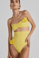 Castano Two Piece Mimosa by Maygel Coronel, ruched bikini with floral detail and high rise bottoms. Perfect for beach days or standout swim looks.
