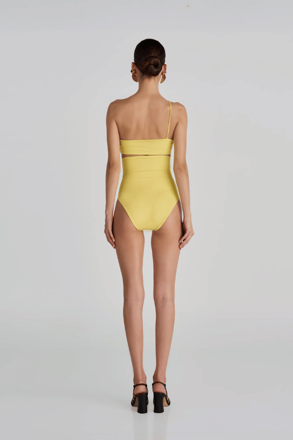 Castano Two Piece Mimosa by Maygel Coronel, ruched bikini with floral detail and high rise bottoms. Perfect for beach days or standout swim looks.
