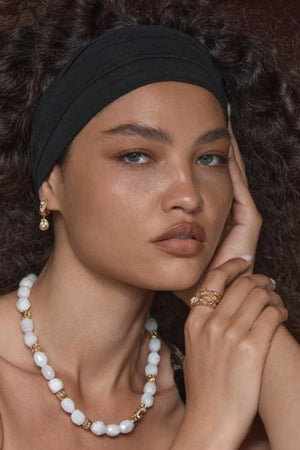 Catania Necklace Gold by Amber Sceats, gold-plated necklace with White Quartz and nugget beads, a trendy piece perfect for layering or chic everyday wear.