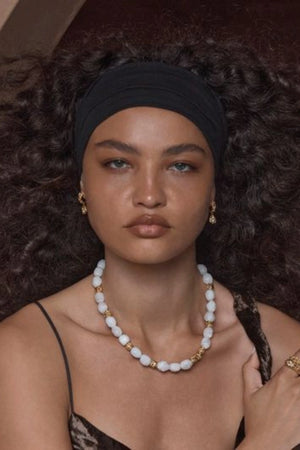 Catania Necklace Gold by Amber Sceats, gold-plated necklace with White Quartz and nugget beads, a trendy piece perfect for layering or chic everyday wear.