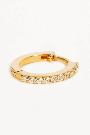 14k Solid Gold Celestial Sleeper by By Charlotte, delicate hoop earring encrusted with white cubic zirconia crystals, perfect for effortless stacking or celestial-inspired layers. Sold as a single earring.