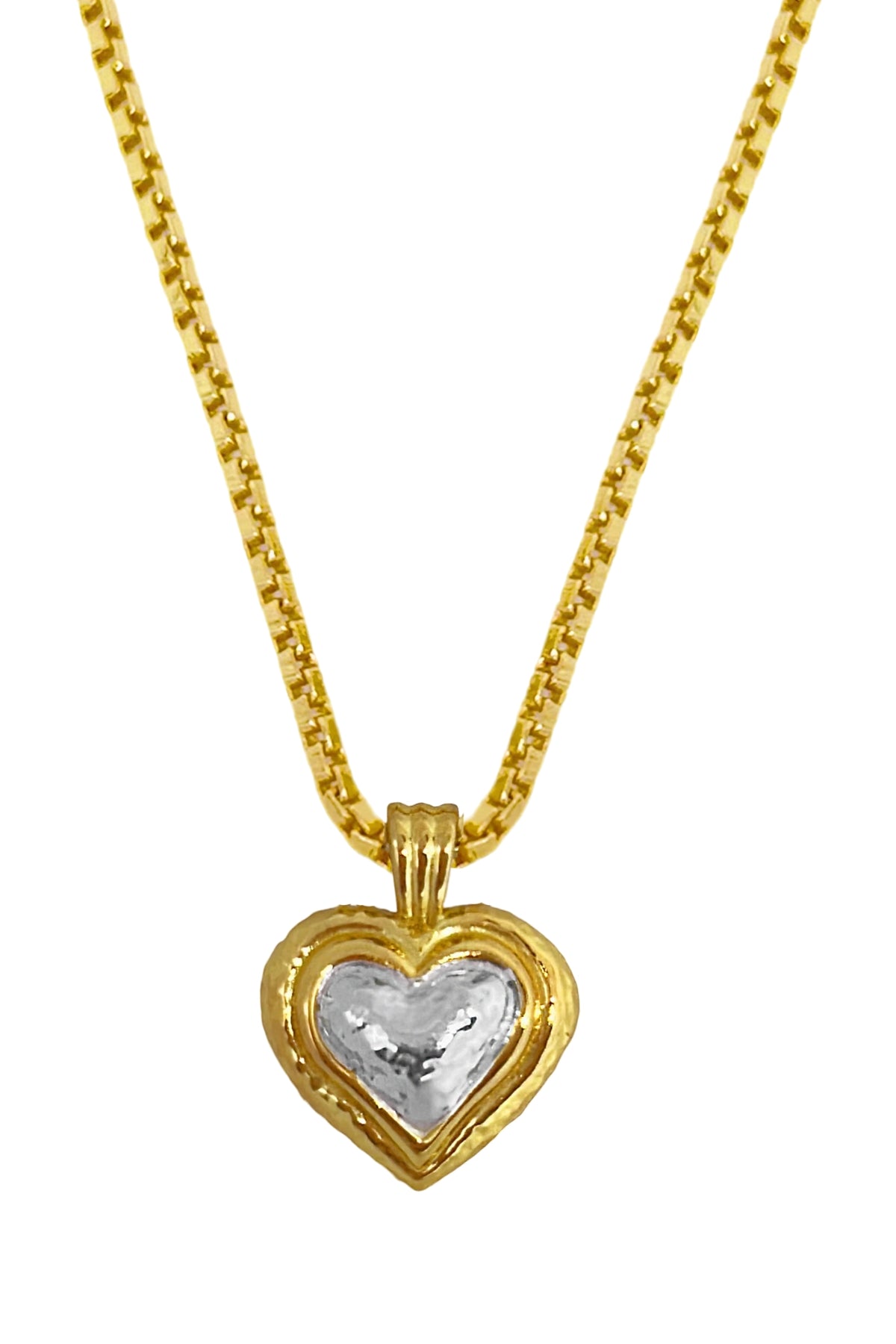 Celine Necklace by Mountain and Moon — a two-tone heart pendant on a gold chain, perfect for everyday layering and modern feminine styling.