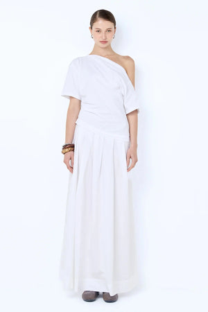 Chantal Off-Shoulder Maxi Dress by Bec + Bridge, this cotton dress features a poplin skirt and jersey bodice. Perfect for summer events.