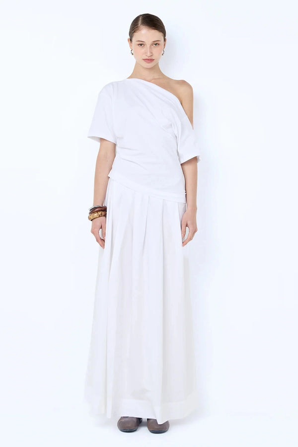 Chantal Off-Shoulder Maxi Dress by Bec + Bridge, this cotton dress features a poplin skirt and jersey bodice. Perfect for summer events.