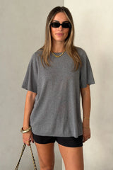 Charli Knit Tee in grey, featuring a soft knit fabric and a relaxed, short-sleeve fit.