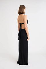 Charlie Dress Black by Pfeiffer, featuring a halter neckline, waist cut-outs and a tulip hem for an effortlessly flattering evening look.
