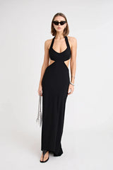 Charlie Dress Black by Pfeiffer, featuring a halter neckline, waist cut-outs and a tulip hem for an effortlessly flattering evening look.
