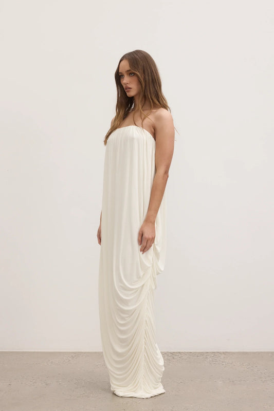 ChatGPT said:

Callista Maxi Dress Ivory by Bayse, strapless draped silhouette with ruched back and side split for effortless summer elegance.
