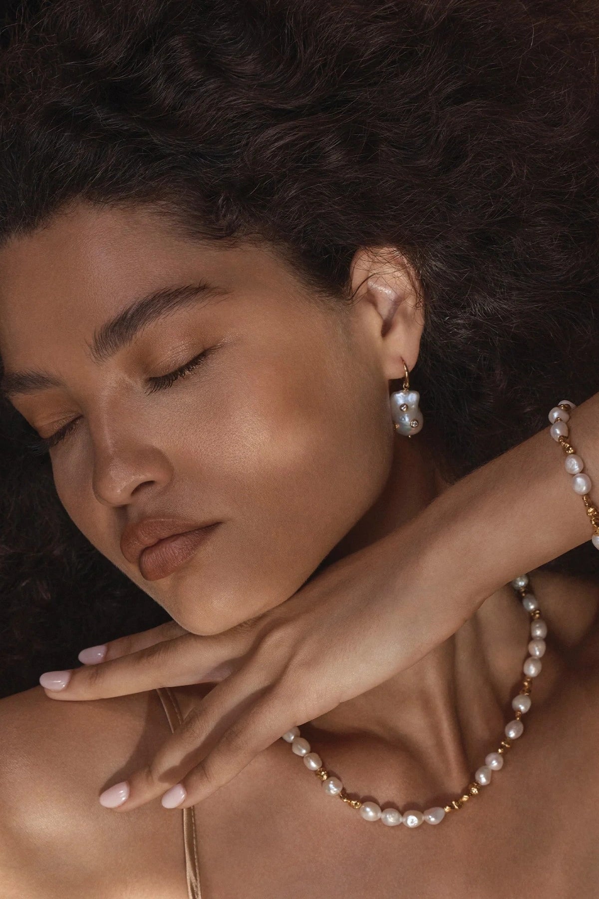 ChatGPT said:

Portofino Necklace by Amber Sceats, handcrafted in Italy with AAA+ freshwater pearls and 24K gold-plated beads for timeless sophistication.